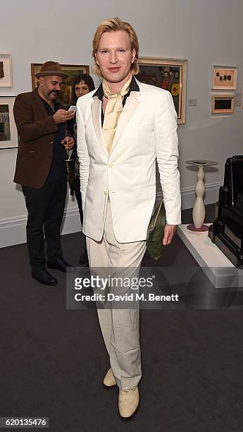Henry Conway attends a private view of 'Bowie/Collector', the personal art collection of David Bowie, at Sotheby's on November 1, 2016 in London,...