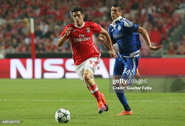 Benfica's forward from Mexico Raul Jimenez with FC Dynamo Kyiv's defender Yevhen Khacheridi from Ukraine in action during the UEFA Champions League...