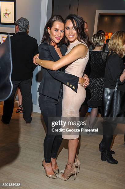 Jessica Mulroney and actress Meghan Markle attend the World Vision event held at Lumas Gallery on March 22, 2016 in Toronto, Canada.