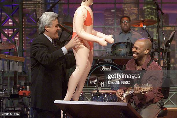 Episode 2455 -- Pictured: Host Jay Leno and crew members Marvin "Smitty" Smith and Kevin Eubanks during the monologue on March 27, 2003 --