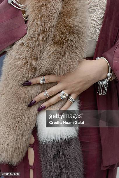Singer Andra Day, hand detail, attends PANDORA Jewelry VIP Holiday Event on November 1, 2016 in New York City.