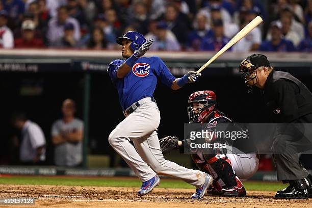 Addison Russell of the Chicago Cubs hits a grand slam home run during the third inning against the Cleveland Indians in Game Six of the 2016 World...
