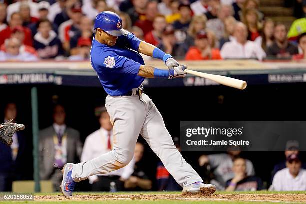 Addison Russell of the Chicago Cubs hits a grand slam home run during the third inning against the Cleveland Indians in Game Six of the 2016 World...