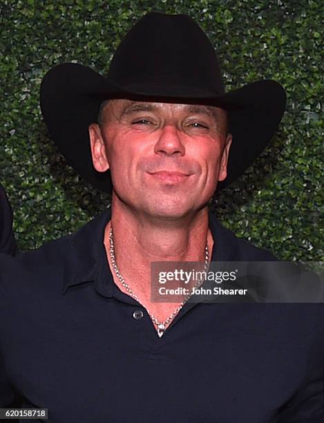 President and CEO of BMI Mike O'Neill, Singer-Songwriter Kenny Chesney and Vice President of Writer-Publisher Relations Jody Williams attend the 64th...