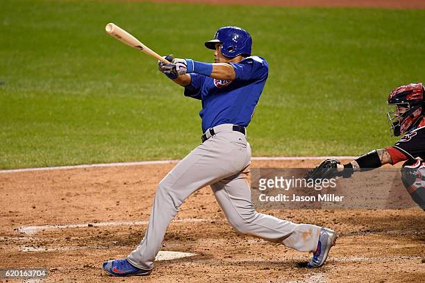 Addison Russell of the Chicago Cubs hits a grand slam home run during the third inning against the Cleveland Indians in Game Six of the 2016 World...