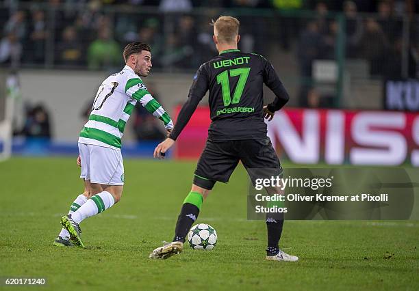 Midfielder Ryan Christie of Celtic FC Glasgow 1888 passing the ball while Defender Oscar Wendt of Borussia Moenchengladbach tries to intervene during...