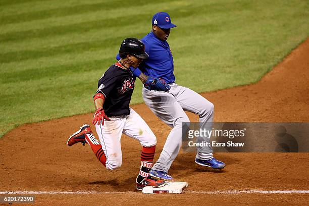 Aroldis Chapman of the Chicago Cubs forces out Francisco Lindor of the Cleveland Indians at first base to end the seventh inning in Game Six of the...