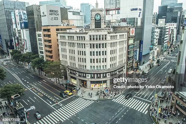 view of ginza 4cyome intersection - ginza stock pictures, royalty-free photos & images