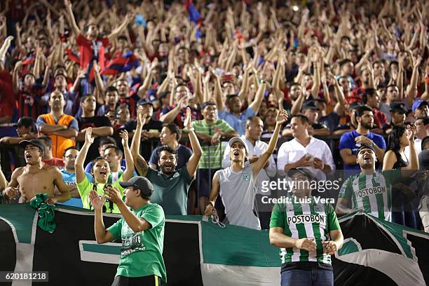 Fans of Atletico Nacional cheer for their team during a first leg match between Cerro Porteño and Atletico Nacional as part of Semi Final of Copa...