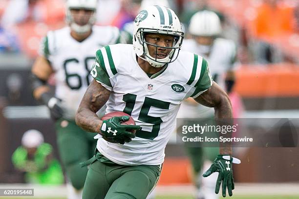 New York Jets Wide Receiver Brandon Marshall runs after making a catch during the fourth quarter of the NFL game between the New York Jets and...