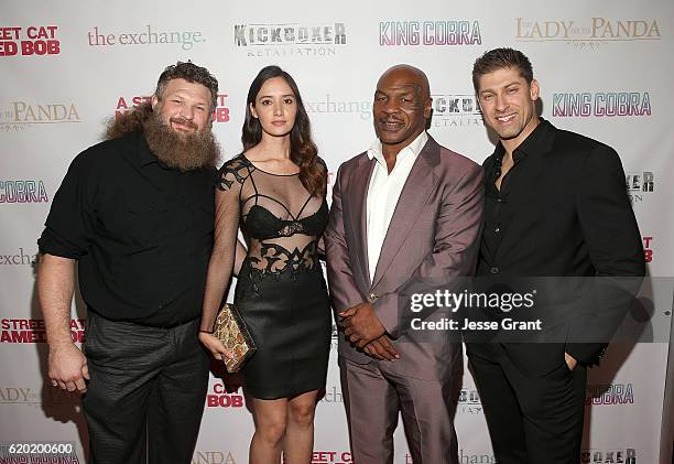 Roy Nelson, Sara Malakul Lane, Mike Tyson and Alain Moussi attend AFM'16 The Exchange's 5 Year Anniversary Celebration on November 1, 2016 in Santa...