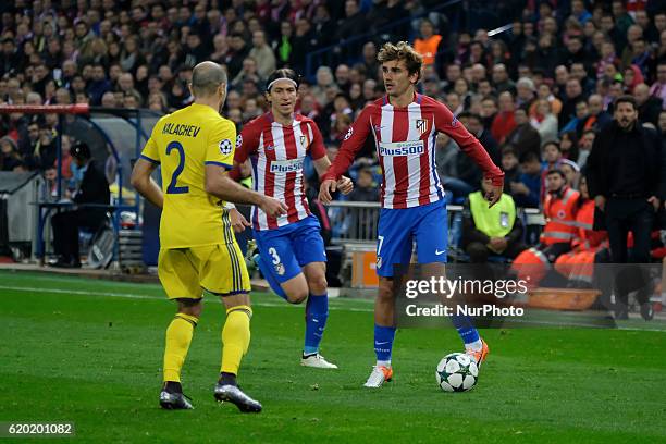 Antoine Griezmann and Filipe Luis of Atletico Madrid in action during the UEFA Champions League Group D match between Club Atletico de Madrid and FC...