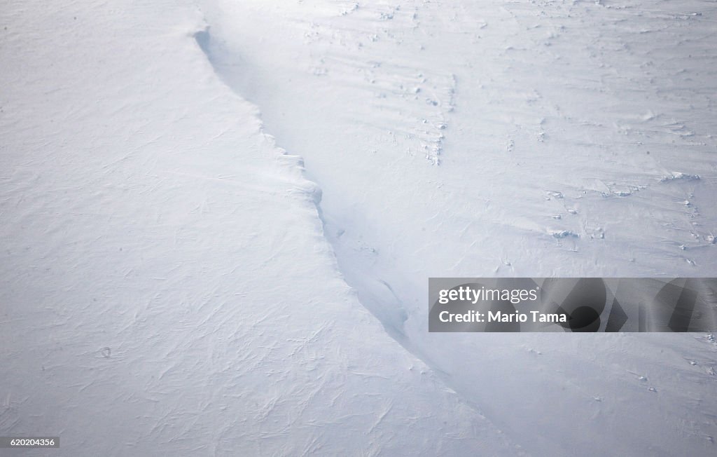 Windblown ice is viewed near the coast of West Antarctica from a ...
