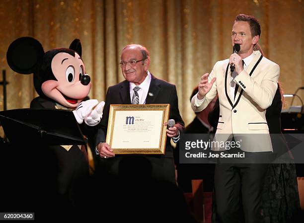 Recipient of Diane Disney Miller Lifetime Achievement Award, Marty Sklar and Master of Ceremonies, Neil Patrick Harris speak onstage at The Walt...
