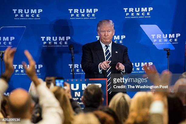 Republican presidential candidate Donald Trump points to the crowd after speaking during a campaign event at the DoubleTree by Hilton Philadelphia...