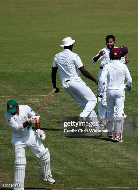 Devendra Bishoo of West Indies takes the wicket of Sarfraz Ahmed of Pakistan on day four of the third test between Pakistan and West Indies at at...