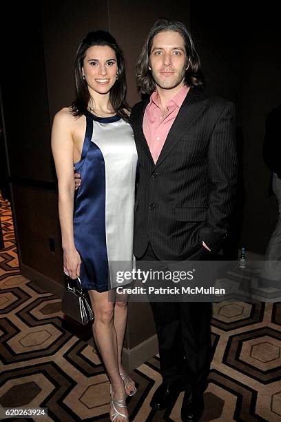 Milena Govich and David Cornue attend THE CINEMA SOCIETY & IWC host a screening of "MY BLUEBERRY NIGHTS" at Tribeca Grand Screening Room on April 2,...