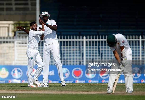 Devendra Bishoo of West Indies celebrates taking the wicket of Azhar Ali of Pakistan on day four of the third test between Pakistan and West Indies...