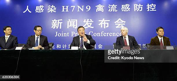 China - Officials of China's National Health and Family Planning Commission and the World Health Organization hold a joint press conference in...