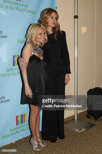 Kristin Chenoweth and Julia Roberts attend A Celebration of Paul Newman's Hole in the Wall Camps at Avery Fisher Hall on June 8, 2009 in New York.