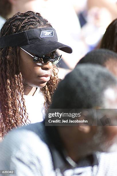 Venus Williams watches her sister Serena play Kim Clijsters of Belgium during the final of the Tennis Masters Series at Indian Wells, California....