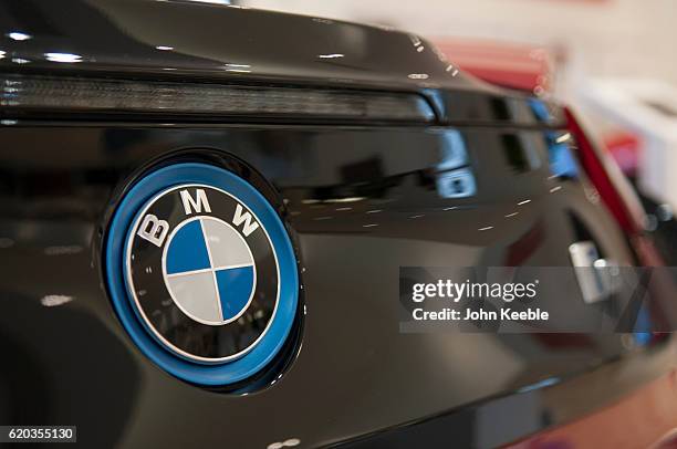 Logo badge on a new red and black BMW i8 Edrive on October 20, 2016 in Southend, United Kingdom.