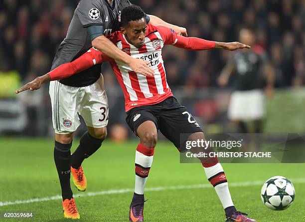 Eindhoven's defender Joshua Brenet plays the ball during the UEFA Champions League group D football match between PSV Eindhoven and Bayern Munich at...