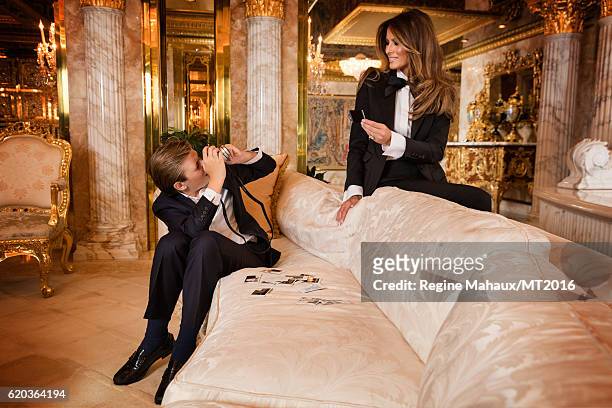 Barron Trump is using the new FUJIFILM instax mini 90 as he and Melania Trump are photographed at Trump Tower on January 6, 2016 in New York City.