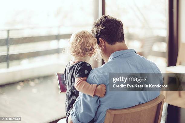 reading a book - elegance family stock pictures, royalty-free photos & images