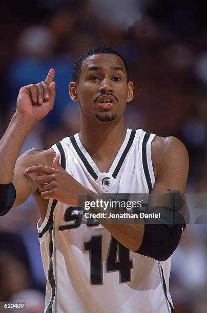 Charlie Bell of the Michigan State Spartans reacts to a play during the game against the Penn State Nittany Lions at the United Center in Chicago,...