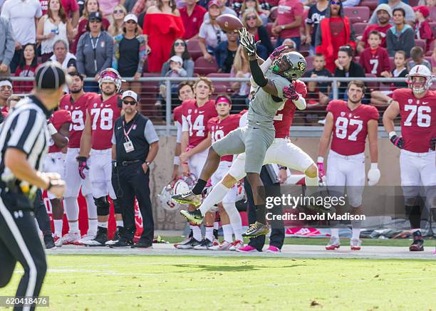 Chidobe Awuzie of the University of Colorado Buffaloes attempts to intercept a pass intended for Trenton Irwin of Stanford during an NCAA Pac-12...