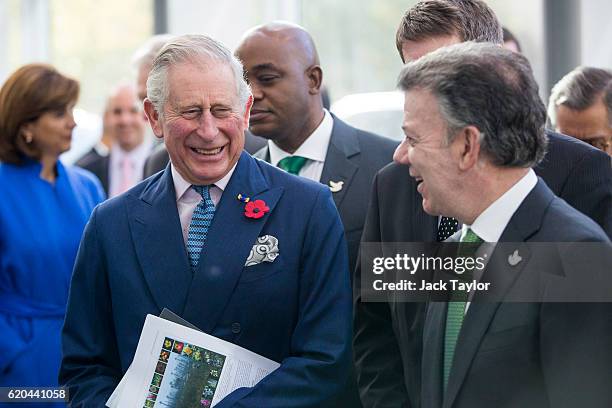 Colombian President Juan Manuel Santos and Prince Charles, Prince of Wales laugh as they are shown a natural history display at the Darwin Centre at...