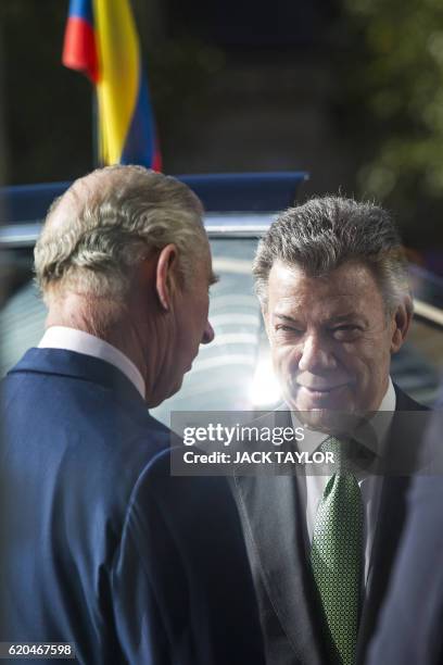 Britain's Prince Charles, Prince of Wales talks with Colombian President Juan Manuel Santos following a tour of the Darwin Centre at the Natural...