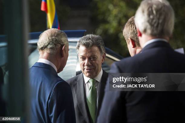 Britain's Prince Charles, Prince of Wales talks with Colombian President Juan Manuel Santos following a tour of the Darwin Centre at the Natural...