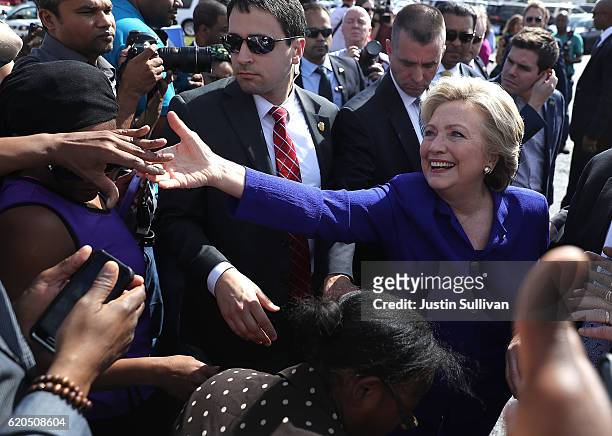 Democratic presidential nominee former Secretary of State Hillary Clinton greets early voters at an early voting site on November 2, 2016 in...