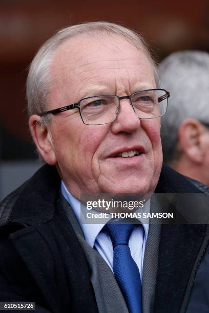 Mayor of Argenteuil Georges Mothron looks on, as he escorts the mayor of Bordeaux and right-wing Les Republicains party's candidate for the party's...