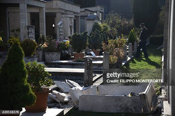 Picture shows damaged graves in the cemetery of Norcia, on November 2, 2016 three days after a 6.5 magnitude earthquake hit central Italy. Some 3,000...