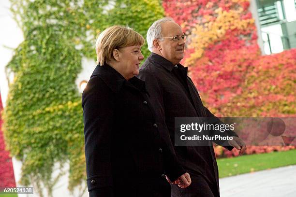 German Chancellor Angela Merkel and Swiss President Johann Schneider-Ammann are pictured after reviewing the guard of honour at the Chancellery in...