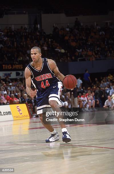 Richard Jefferson of the Arizona Wildcats moves with the ball during the game against the Southern California Trojans at the Los Angeles Sports Arena...