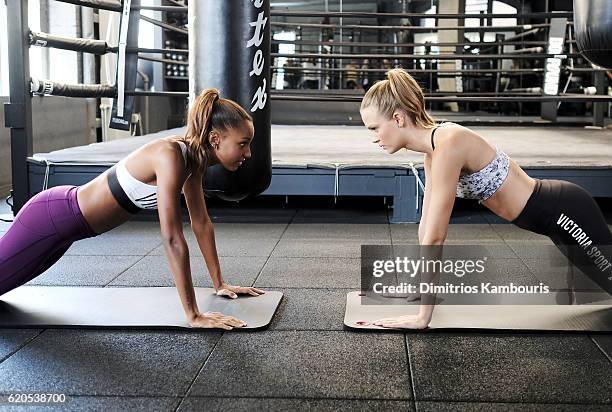 Models Jasmine Tookes and Josephine Skriver participate in the Victoria's Secret Train Like an Angel event on November 2, 2016 in New York City.