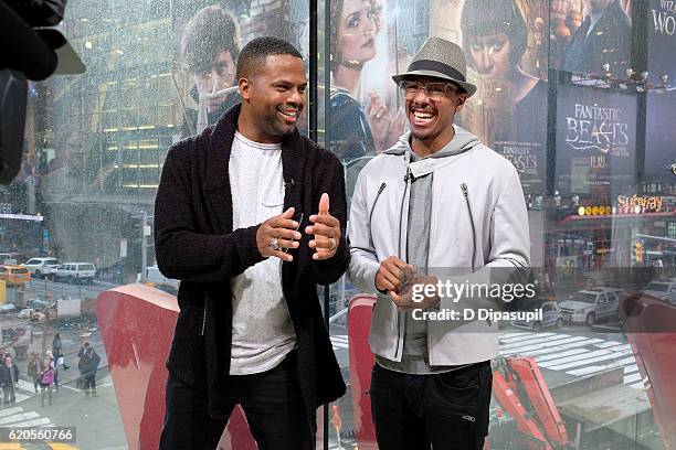 Calloway interviews Nick Cannon during his visit to "Extra" at their New York studios at H&M in Times Square on November 2, 2016 in New York City.