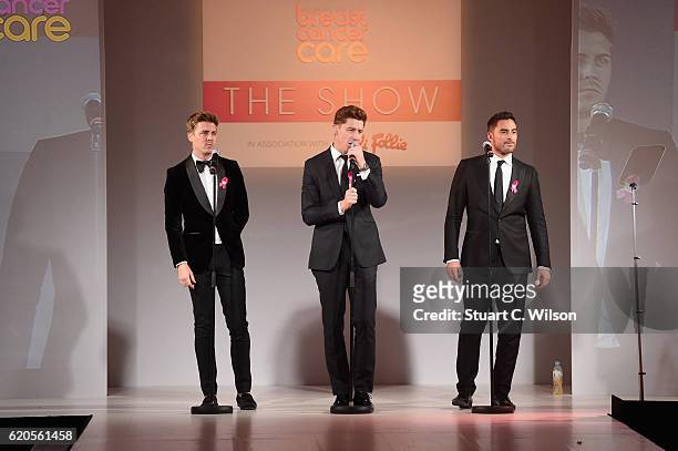 Alfie Palmer, Andrew Bourn and Sean Ryder Wolf of Jack Pack perform on stage at the Breast Cancer Care London Fashion Show in association with Folli...