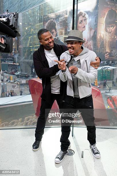 Calloway interviews Nick Cannon during his visit to "Extra" at their New York studios at H&M in Times Square on November 2, 2016 in New York City.