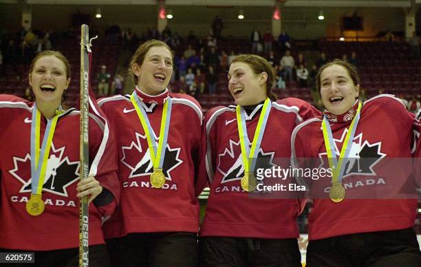 Team Canada players sing their national anthem after they won the Women's World Hockey Championships at Mariucci Arena in Minneapolis, Minnesota....