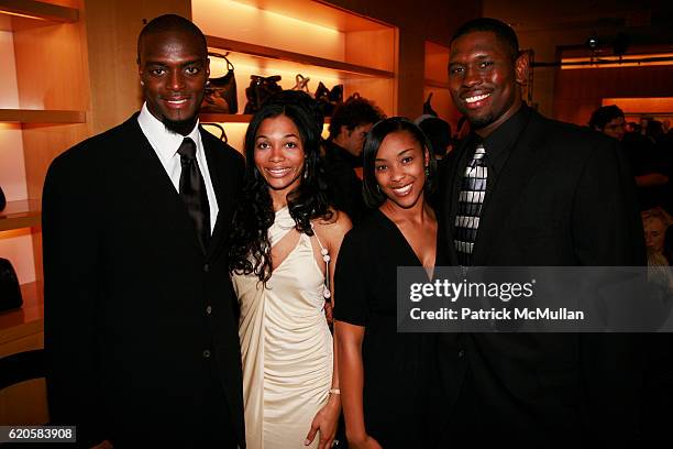 Plaxico Burress, Tiffany Burress, Carissa Johnson, Darcy Johnson and attend GIORGIO ARMANI Runway Presentation Hosted by ROBERTA ARMANI at Giorgio...