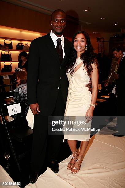 Plaxico Burress and Tiffany Burress attend GIORGIO ARMANI Runway Presentation Hosted by ROBERTA ARMANI at Giorgio Armani Madison Ave on September 16,...