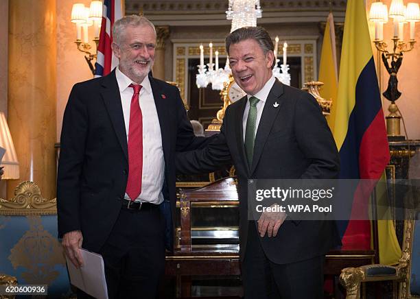 Labour Leader Jeremy Corbyn and Colombian President Juan Manuel Santos meet at Buckingham Palace on November 2, 2016.