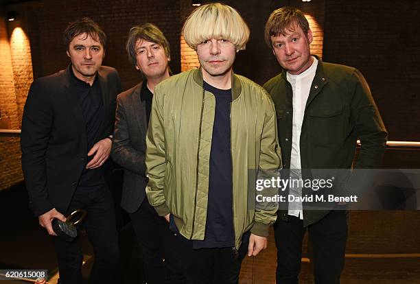 Tony Rogers, Mark Collins, Tim Burgess and Martin Blunt of The Charlatans, winners of the Q Classic Album award for "Tellin' Stories", pose at The...