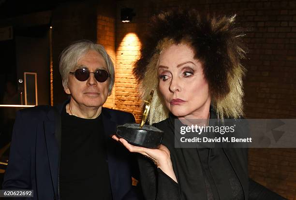 Chris Stein and Debbie Harry of Blondie, winners of the Q Outstanding Contribution To Music award, pose at The Stubhub Q Awards 2016 at The...