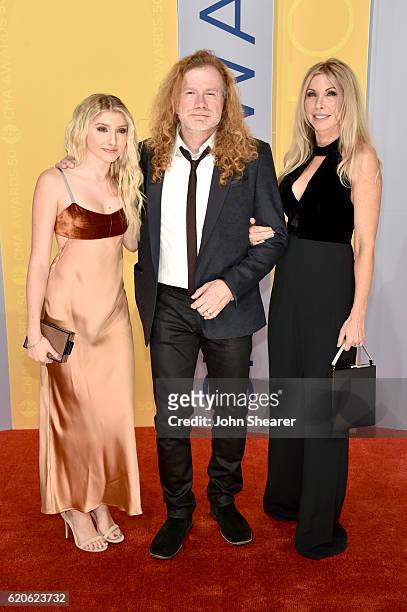 Electra Mustaine, Dave Mustaine and Pamela Anne Casselberry attend the 50th annual CMA Awards at the Bridgestone Arena on November 2, 2016 in...